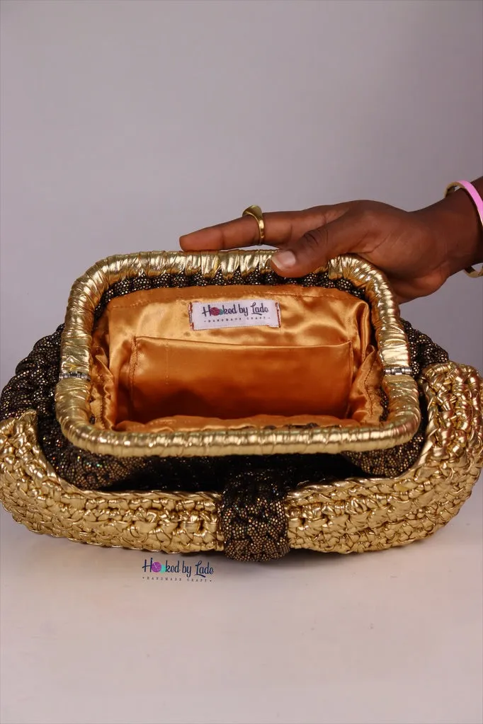 ‘Ajike’ Golden bow clutch purse