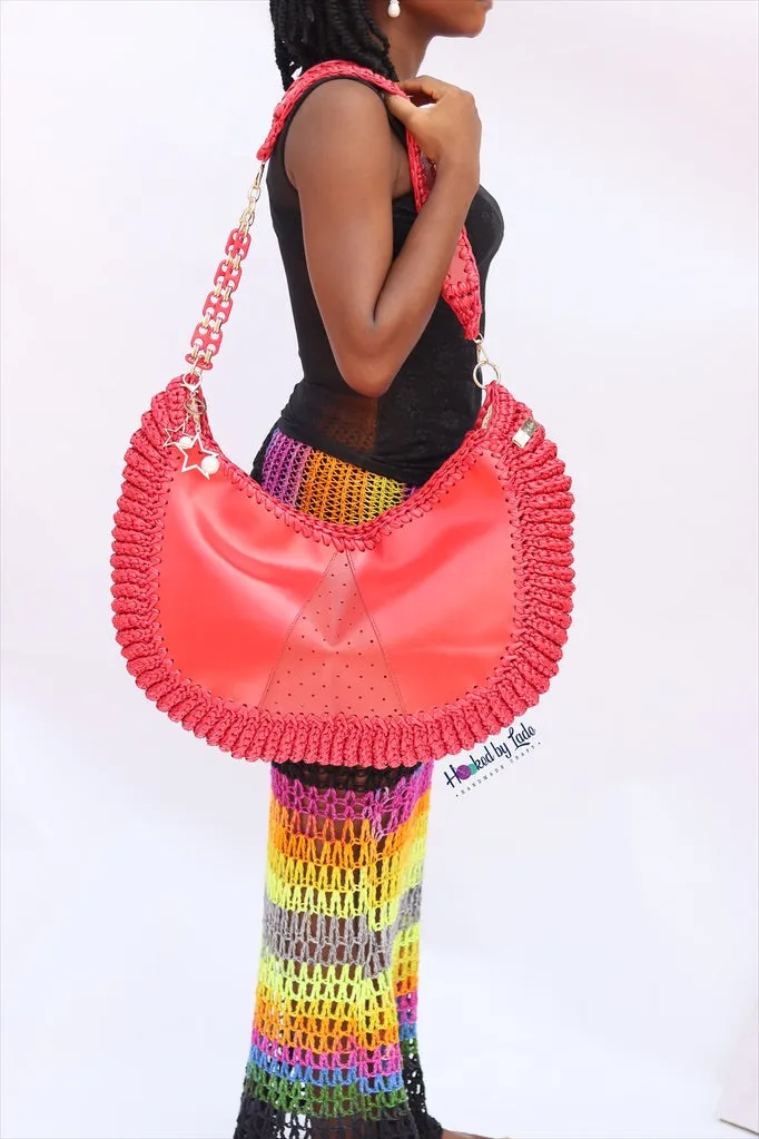 ‘Chidi’ Travel bag in Pepper Red leather