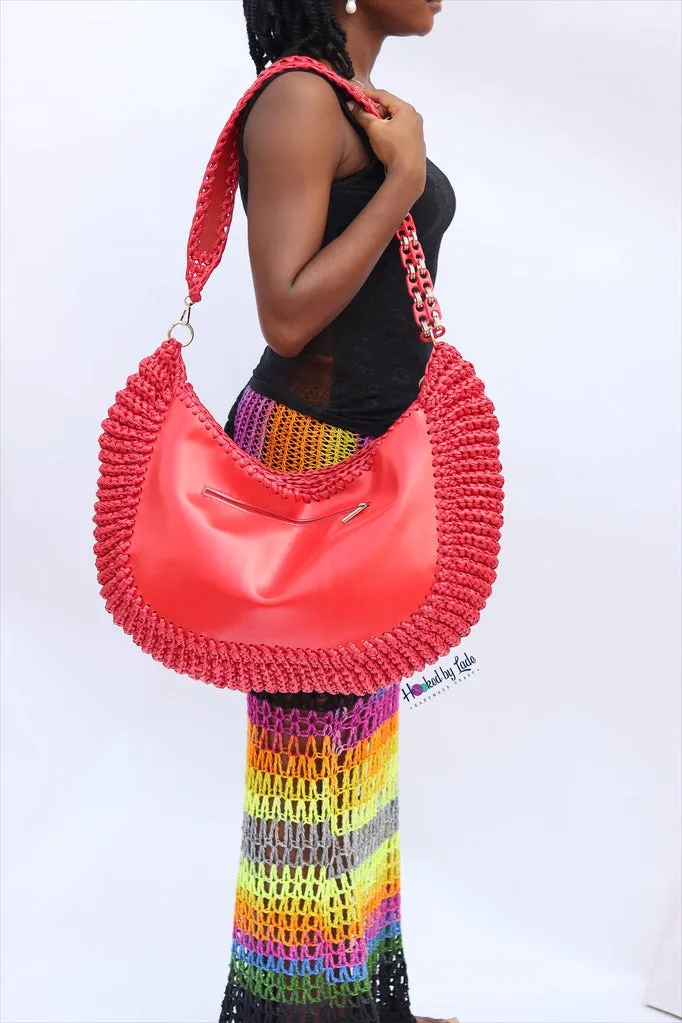 ‘Chidi’ Travel bag in Pepper Red leather