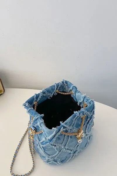 Denim emmertas met kettingkoord en ruwe rand