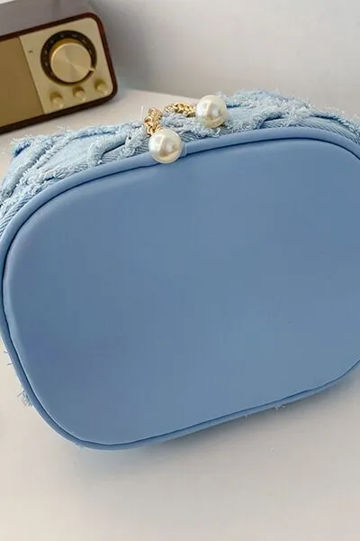 Denim emmertas met kettingkoord en ruwe rand