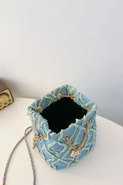 Denim emmertas met kettingkoord en ruwe rand
