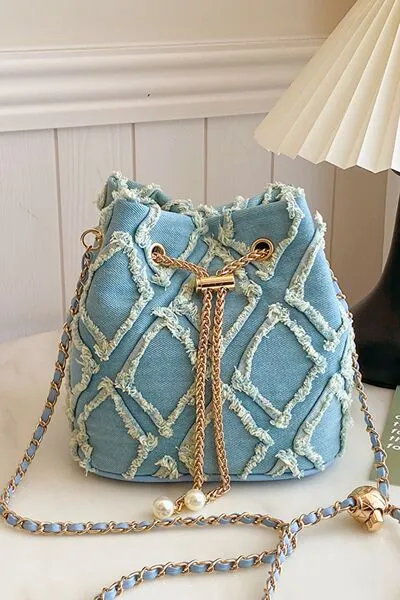 Denim emmertas met kettingkoord en ruwe rand