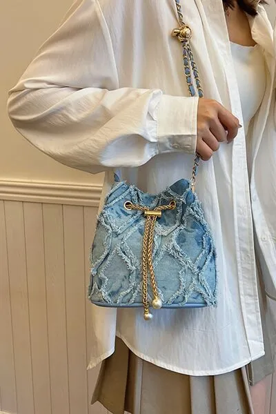 Denim emmertas met kettingkoord en ruwe rand