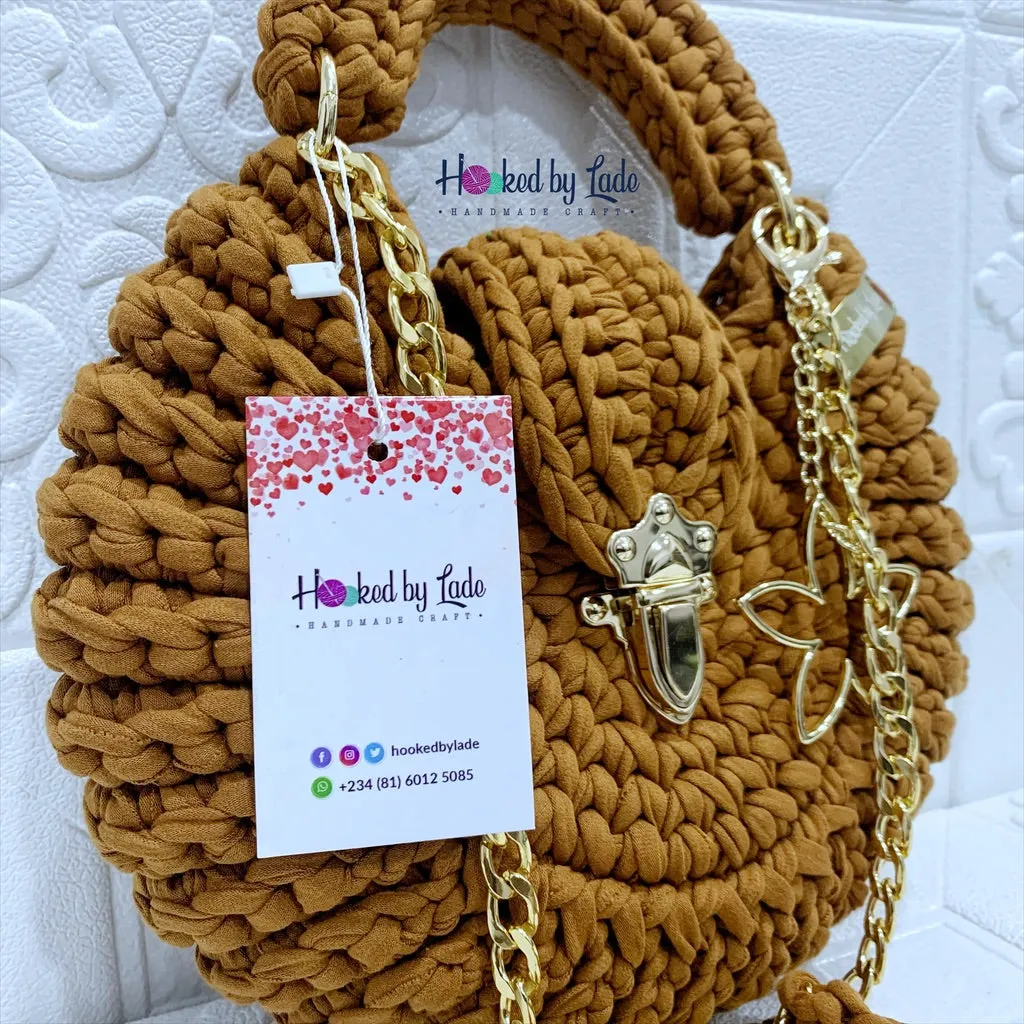 ‘Fola’ Unspiked bag in Tan color
