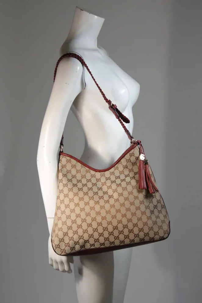 GUCCI Canvas Logo Hobo Style Purse with Tassel