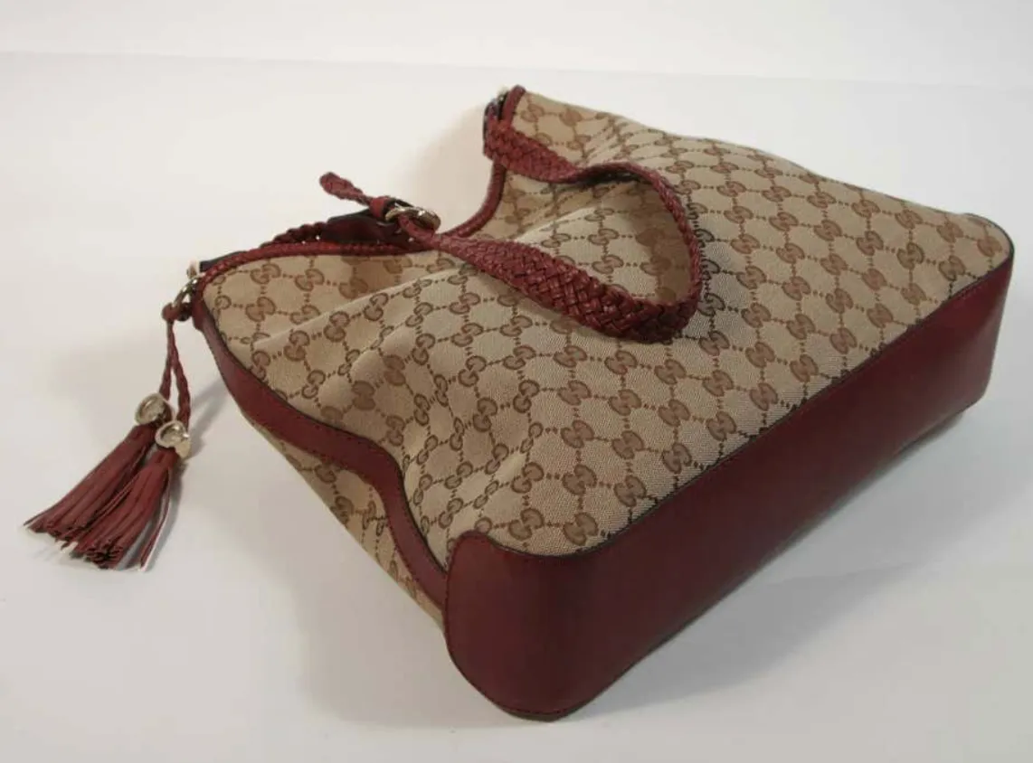GUCCI Canvas Logo Hobo Style Purse with Tassel