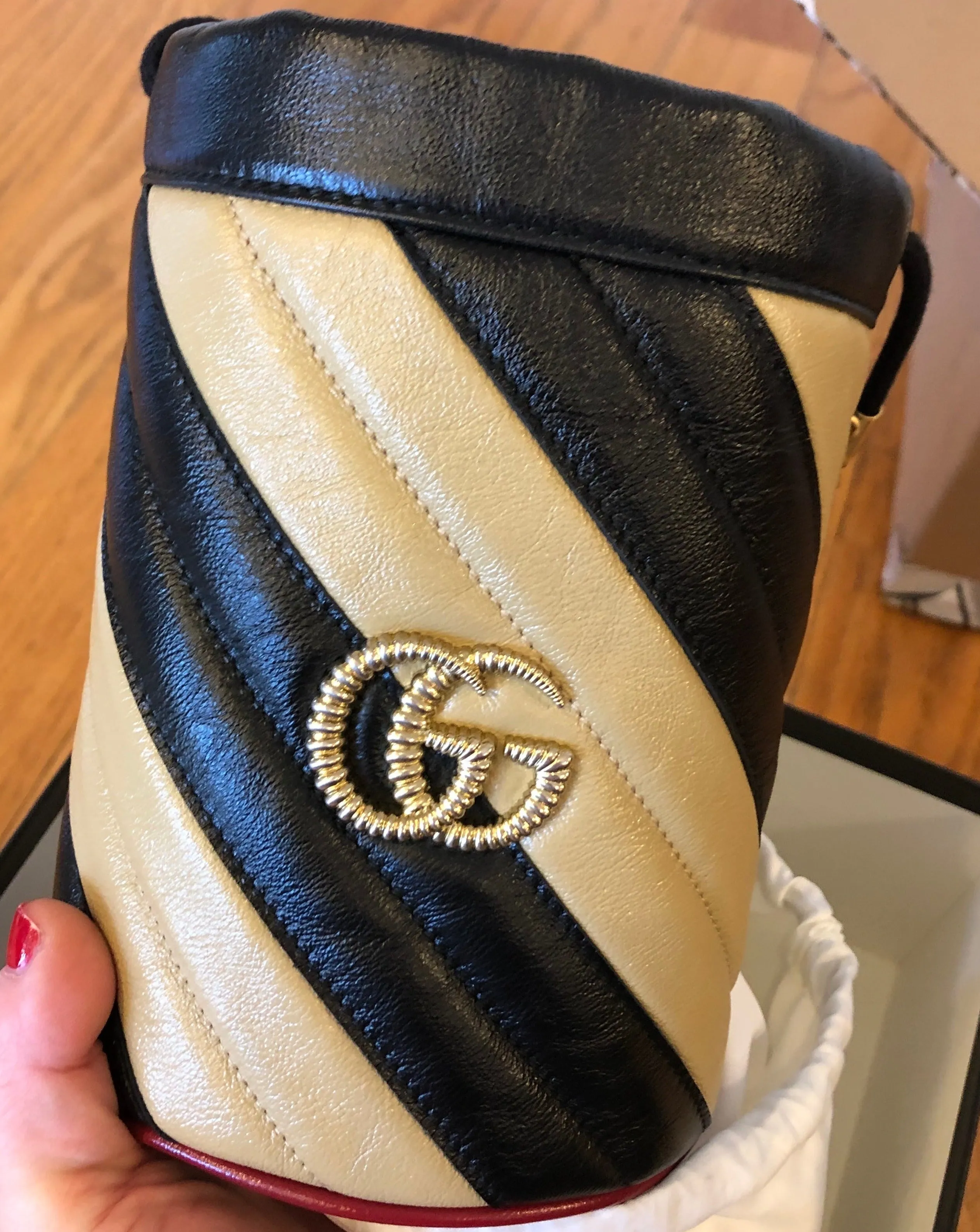Gucci GG Marmont Bucket Bag in Black and Beige with Red Trim