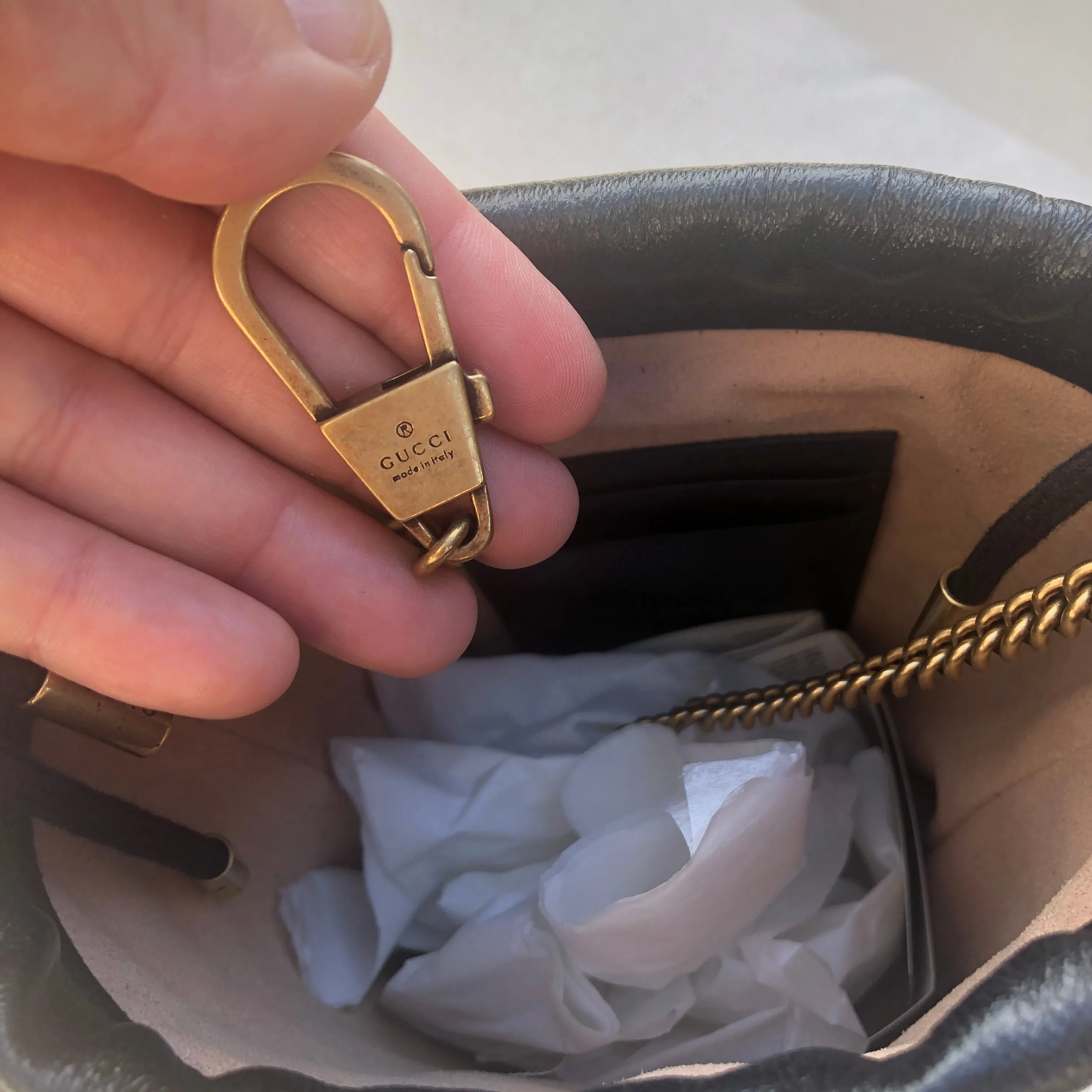 Gucci GG Marmont Bucket Bag in Black and Beige with Red Trim