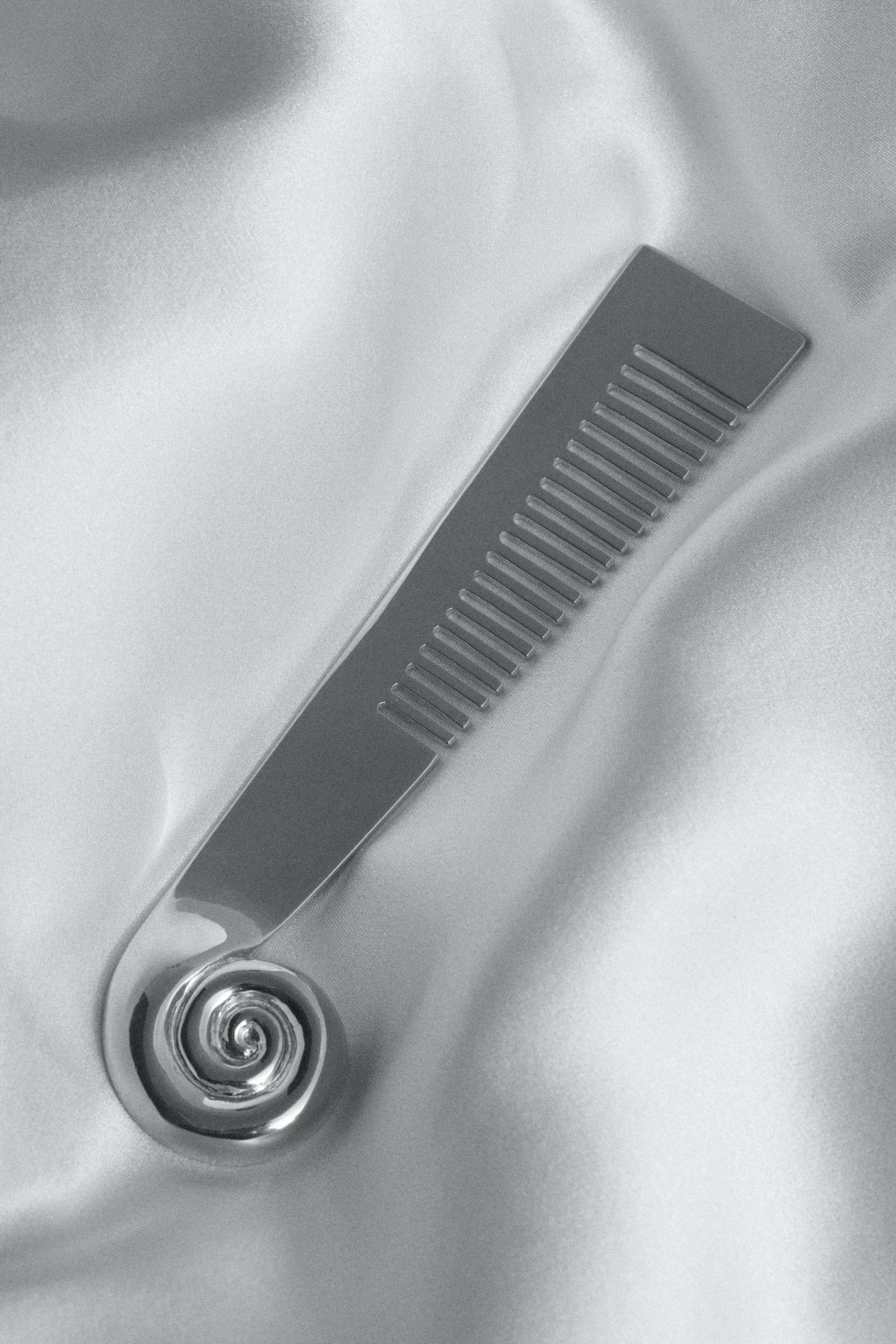 NAUTILUS COMB