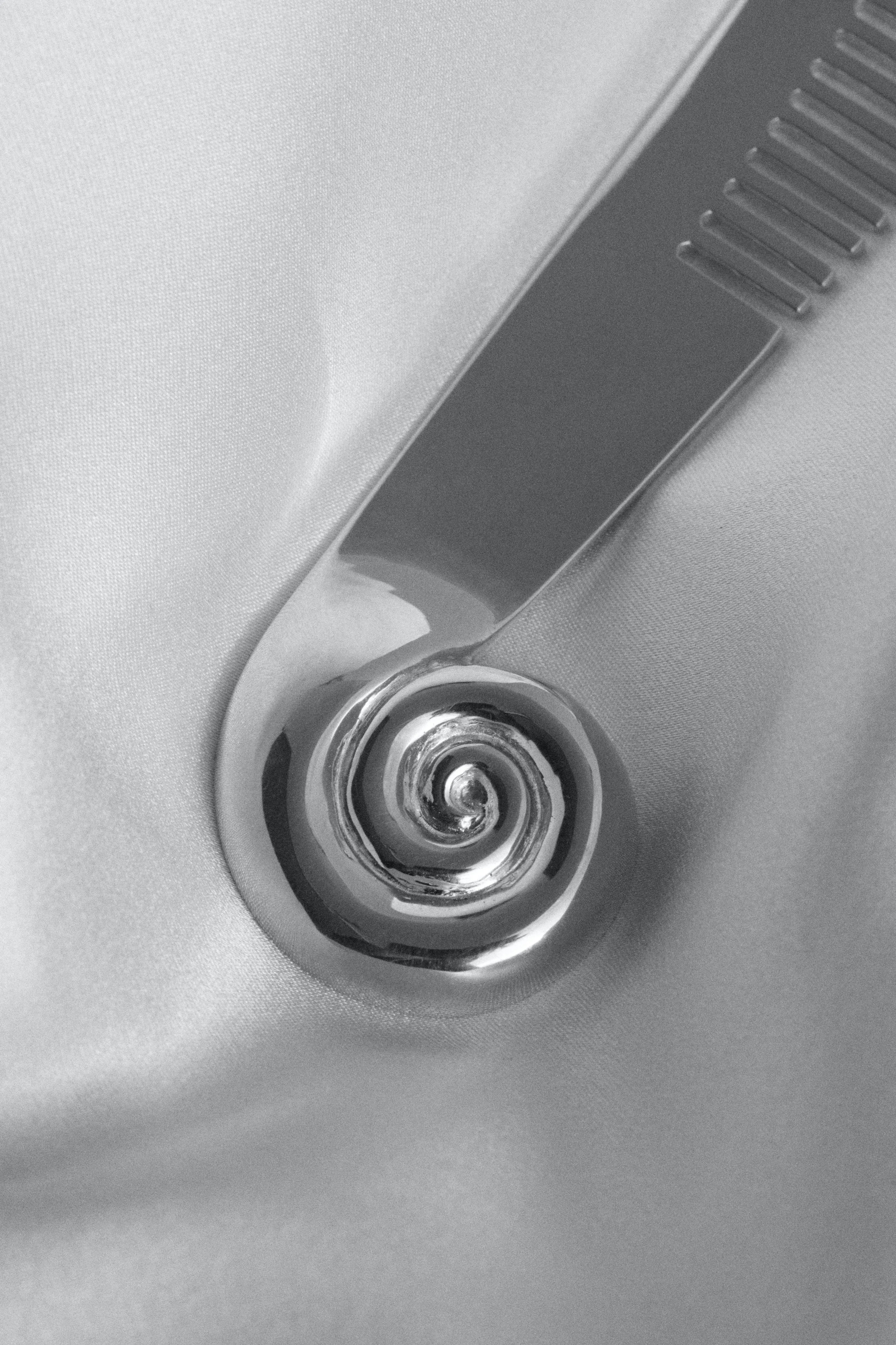 NAUTILUS COMB