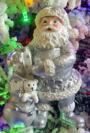 Silver Santa ornament with bag of presents/toys-resin 4"