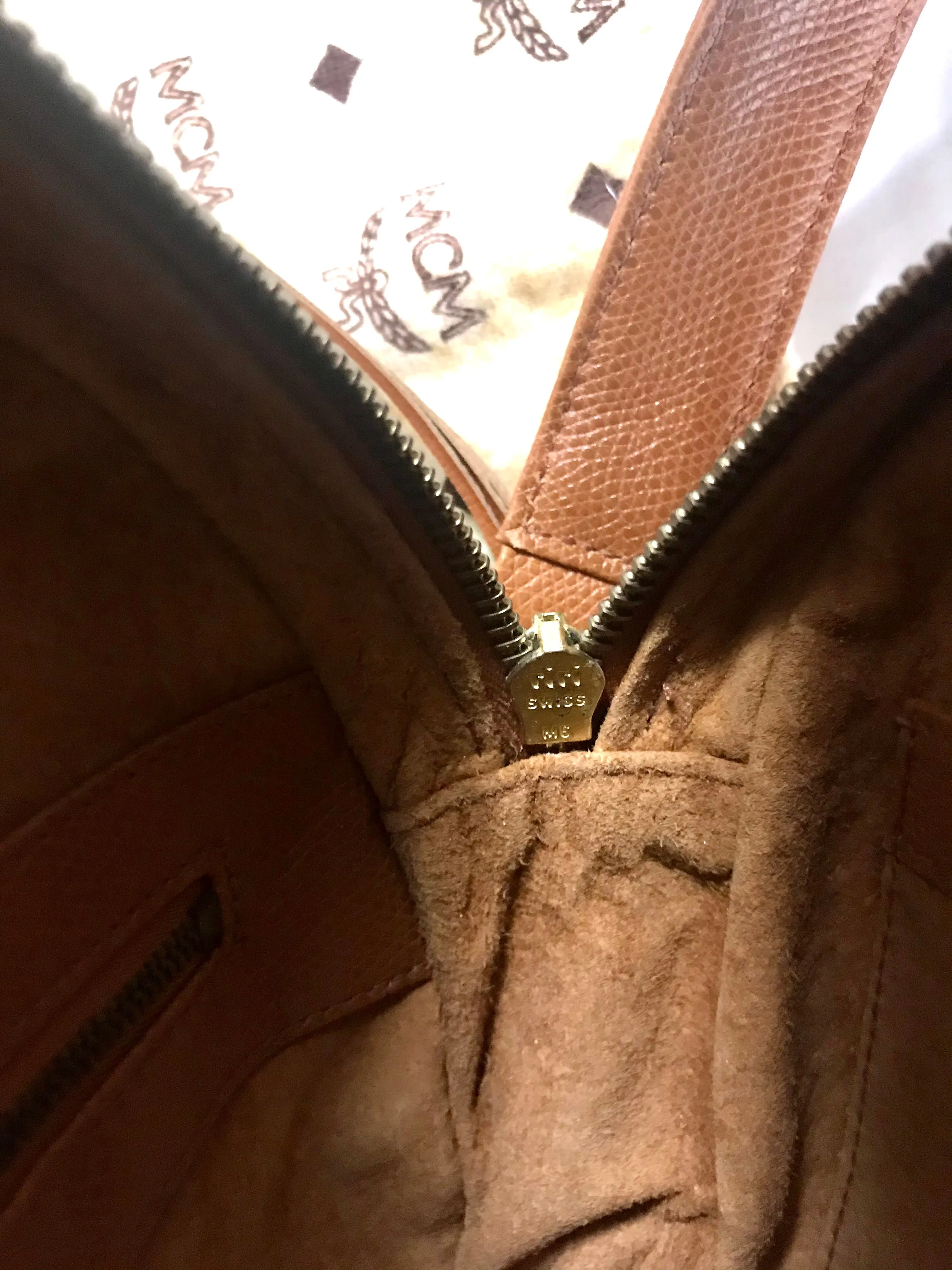 Vintage MCM suzy wong bag, brown grained leather round shoulder bag with studs and fringes. Designed by Michael Cromer. Nature. 060531r8