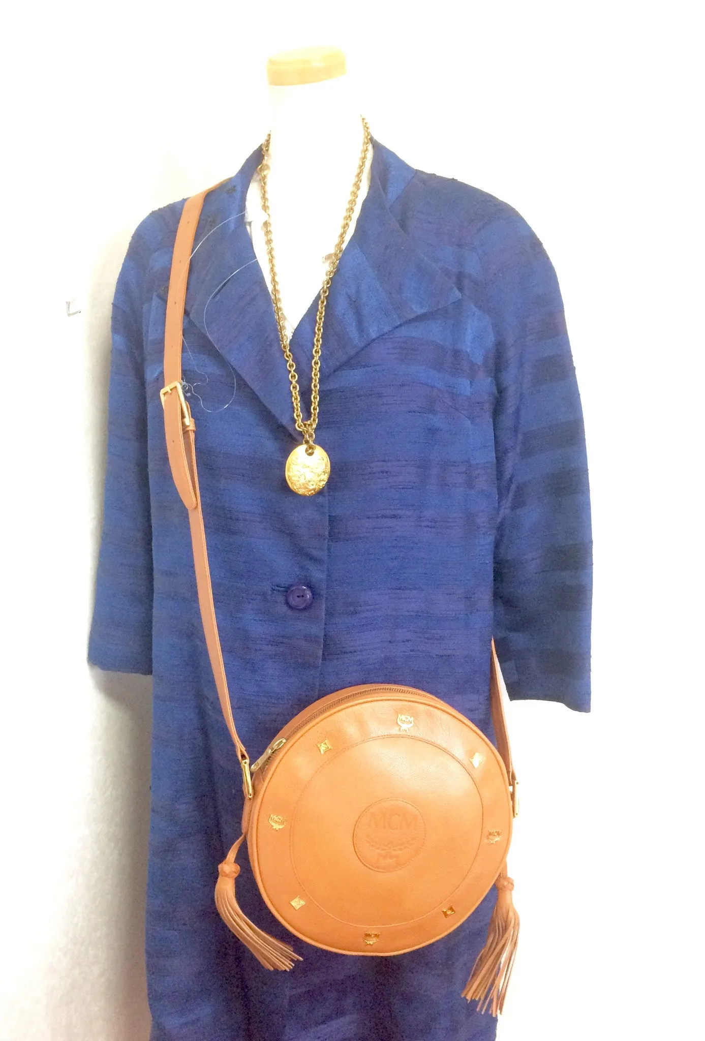 Vintage MCM suzy wong bag, brown grained leather round shoulder bag with studs and fringes. Designed by Michael Cromer. Nature. 060531r8