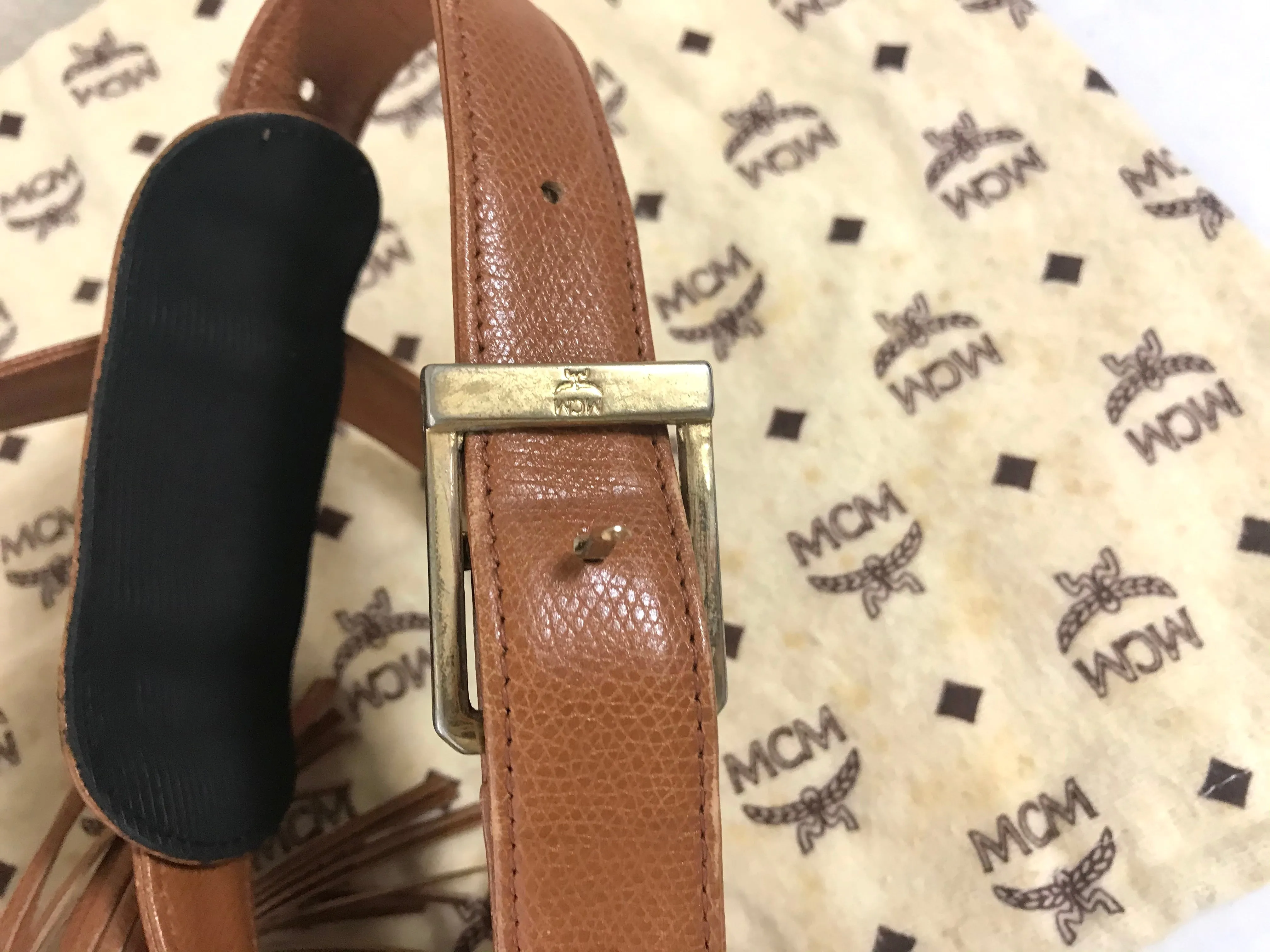 Vintage MCM suzy wong bag, brown grained leather round shoulder bag with studs and fringes. Designed by Michael Cromer. Nature. 060531r8