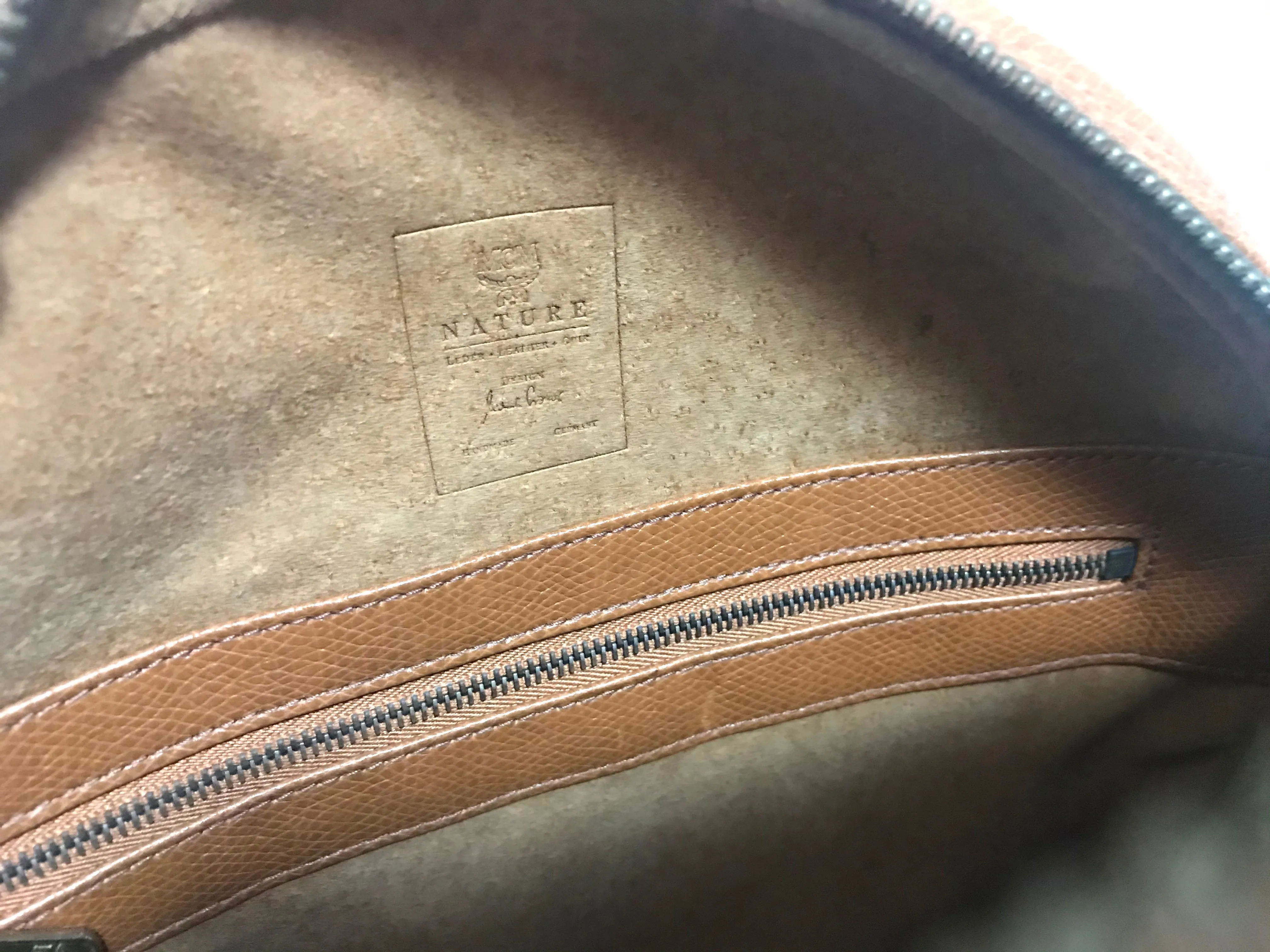 Vintage MCM suzy wong bag, brown grained leather round shoulder bag with studs and fringes. Designed by Michael Cromer. Nature. 060531r8