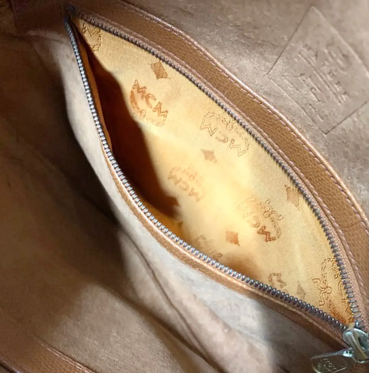 Vintage MCM suzy wong bag, brown grained leather round shoulder bag with studs and fringes. Designed by Michael Cromer. Nature. 060531r8