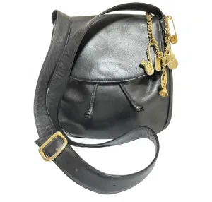Vintage Moschino black leather shoulder bag with golden cute dangling charms. Heart, safety pin, trumpet, sacks, and guitar. 050725